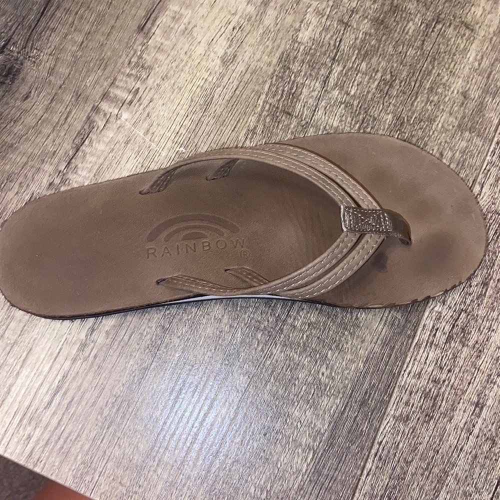 ONE (left) rainbow flip flop. WORN ONCE